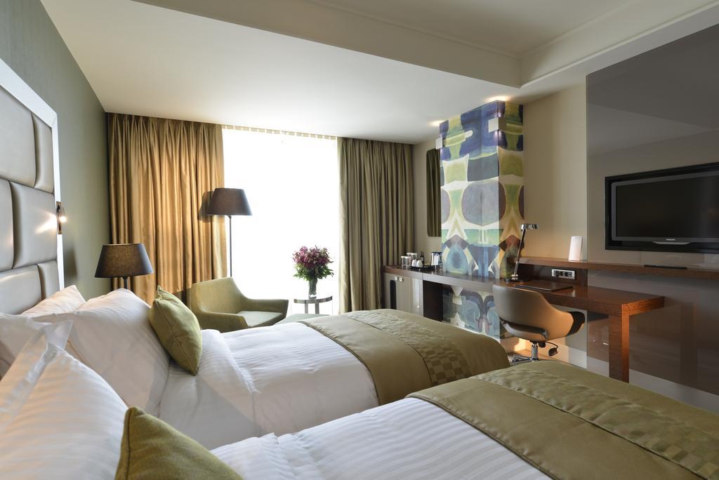 Wyndham Grand Istanbul Europe Hotel Exterior photo A room at the hotel